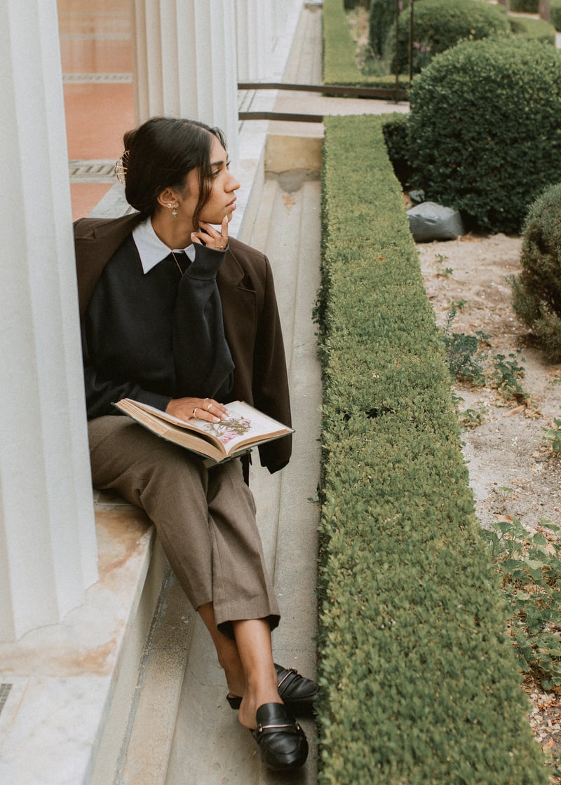 Pensive Woman Reading a Book 